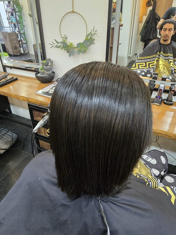 Krullend haar klaar voor styling — Kapsalon Bist Wilrijk